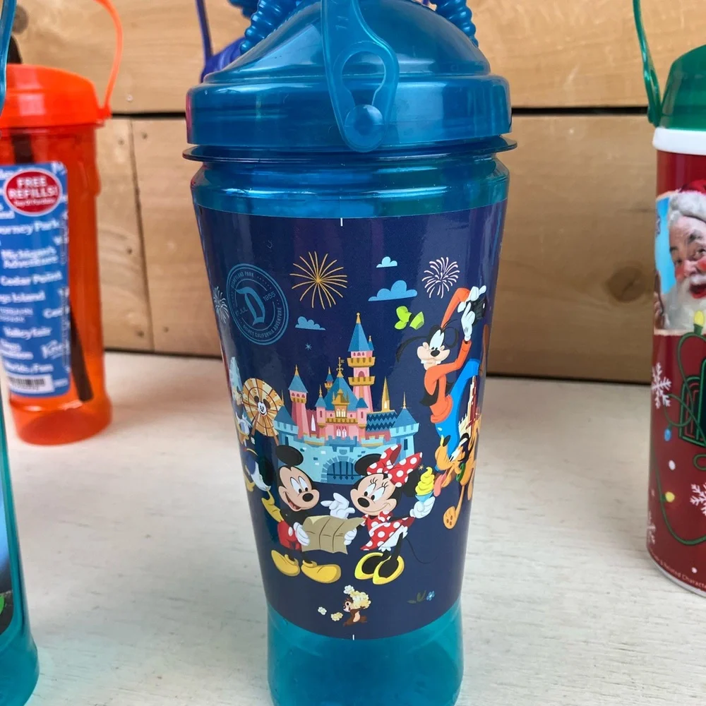 Assorted Lot of 9 Theme Park & Zoo Kids Sipper Cups - Multi-Color Collectable